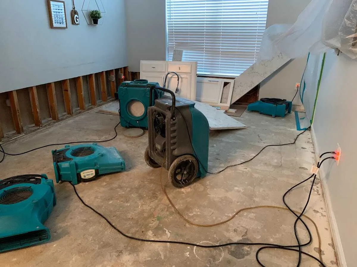 Dehumidifier in flood-cut room for Water Damage Restoration in Champlin